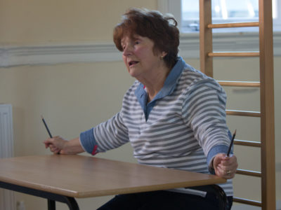 A lady with Parkinson's attends a session at Megan Baker House